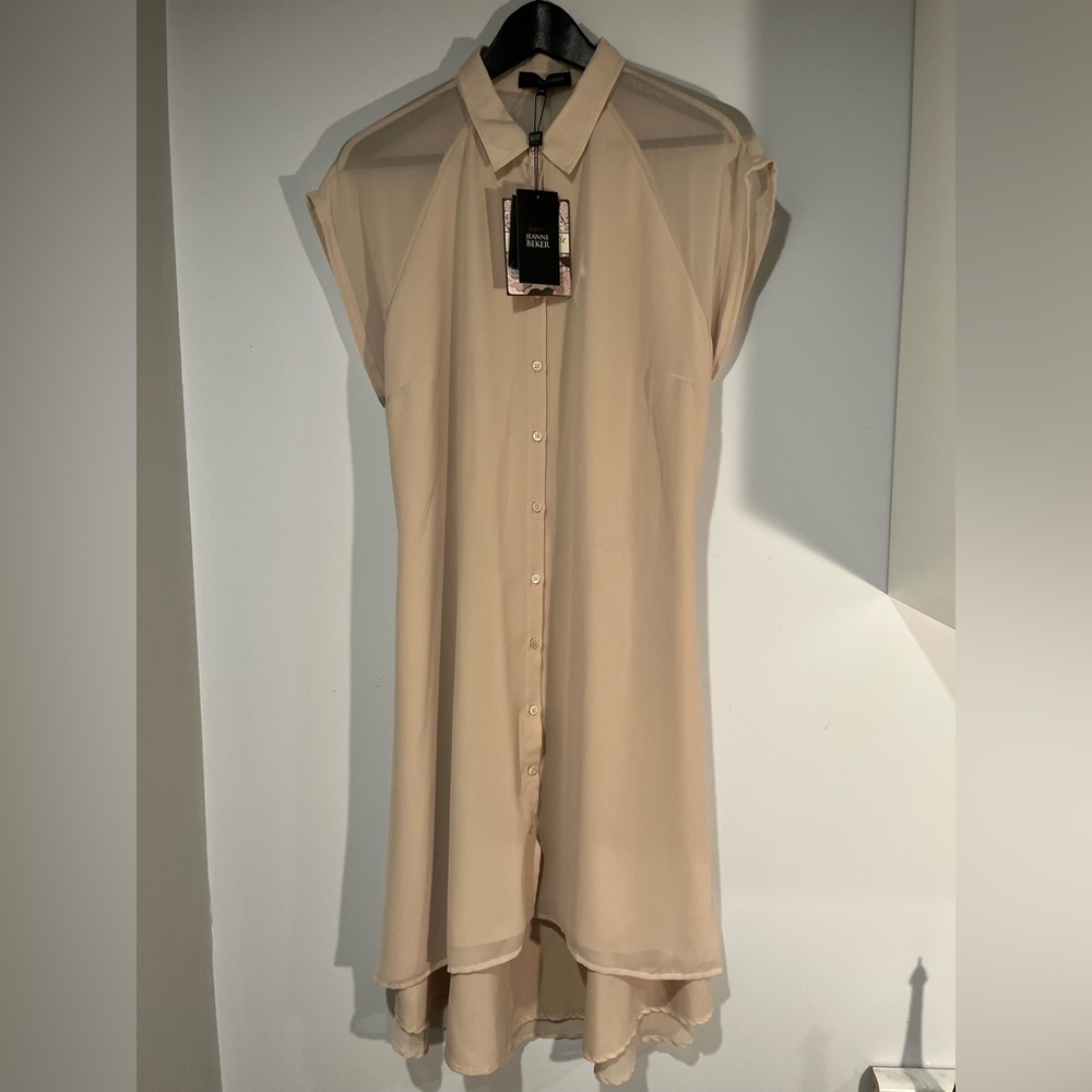 This Jeanne Beker size 14P, 100% polyester with buttons going down the front